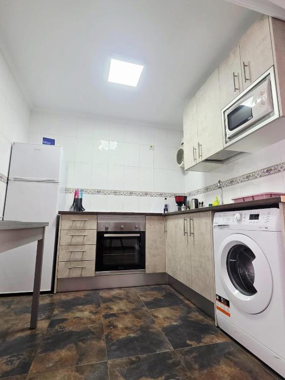 A kitchen or kitchenette at Apartamento calle de la Cordera, 3