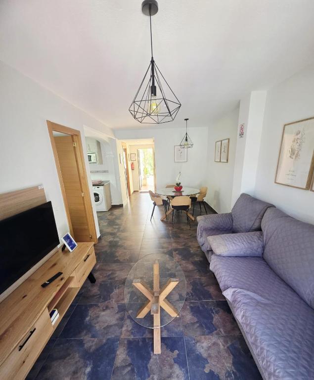 A television and/or entertainment centre at Apartamento calle de la Cordera, 3