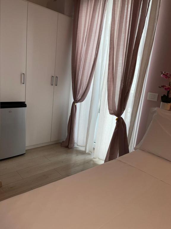 Postel nebo postele na pokoji v ubytování Dimora Francesca