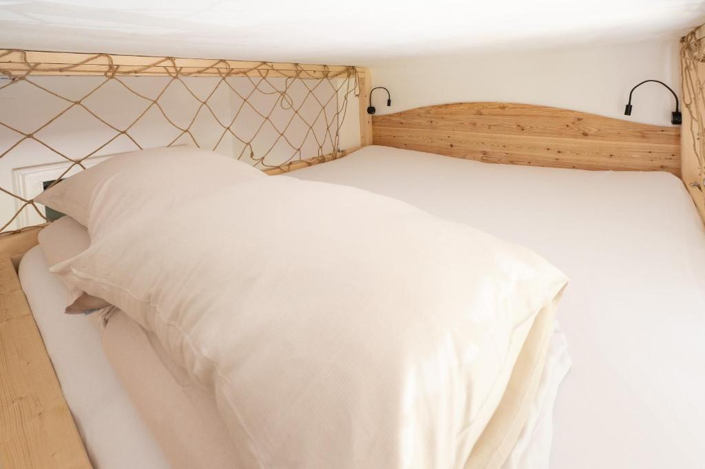 Letto o letti in una camera di Nationalpark Gesäuse Lodge