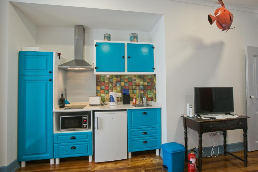 Kuchyň nebo kuchyňský kout v ubytování Casas da villa - Apartments