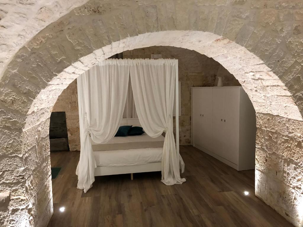 Postel nebo postele na pokoji v ubytování B&B Aurelia