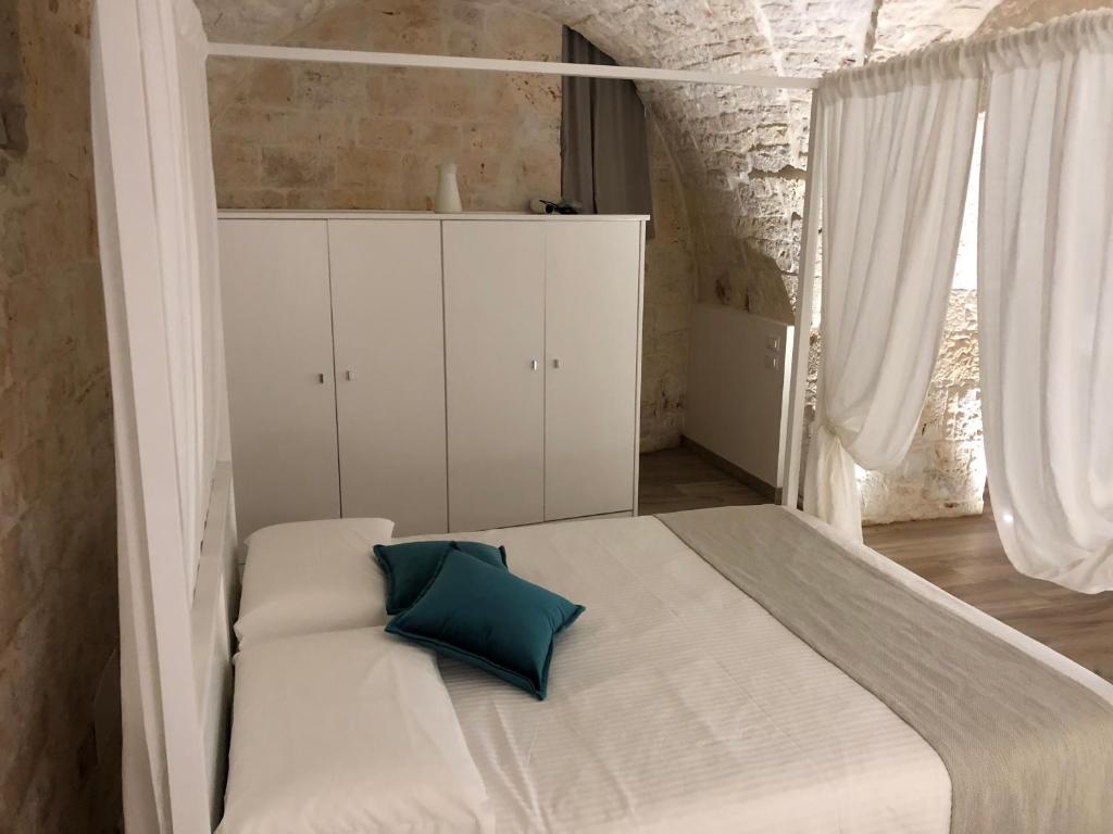 Postel nebo postele na pokoji v ubytování B&B Aurelia