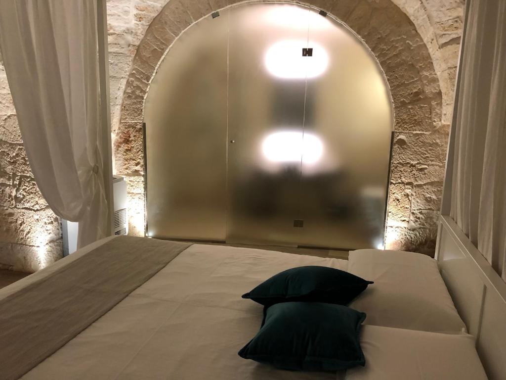 Postel nebo postele na pokoji v ubytování B&B Aurelia
