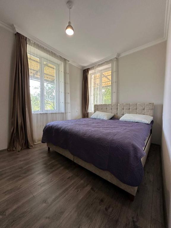 Postel nebo postele na pokoji v ubytování Tazia Appartments