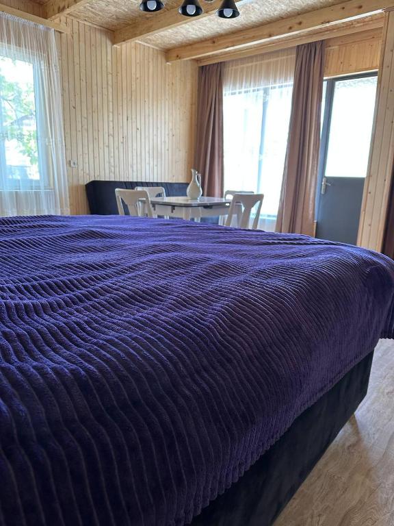 Postel nebo postele na pokoji v ubytování Tazia Appartments
