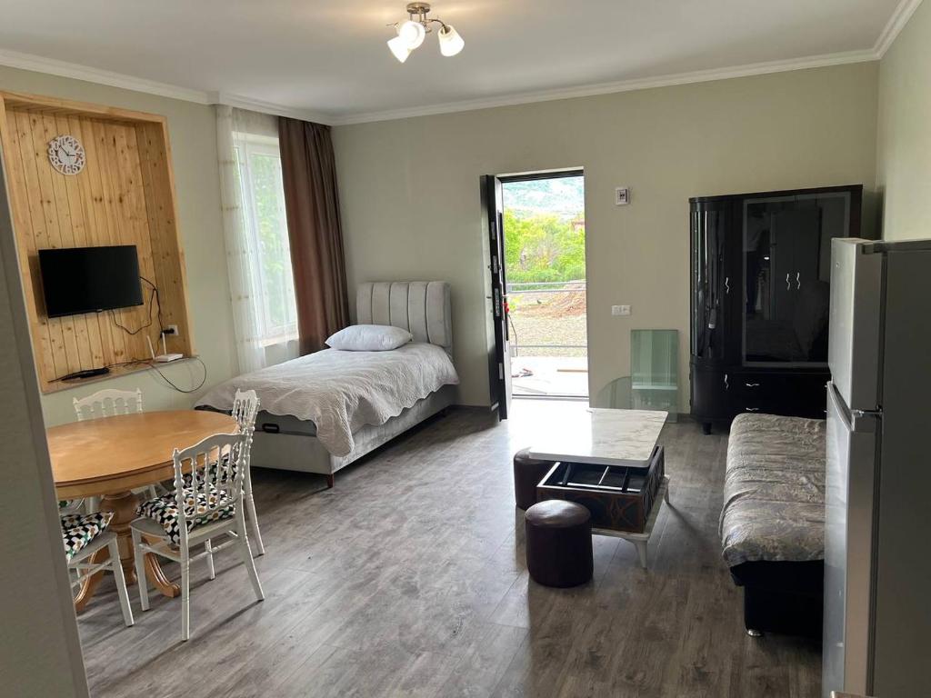 Postel nebo postele na pokoji v ubytování Tazia Appartments