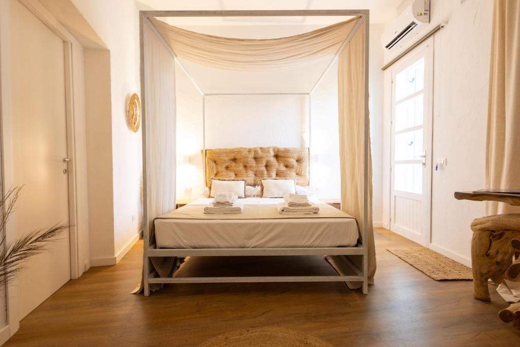 Postel nebo postele na pokoji v ubytování Rada room&suite