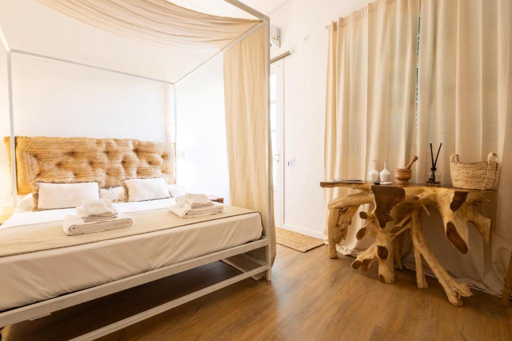 Postel nebo postele na pokoji v ubytování Rada room&suite