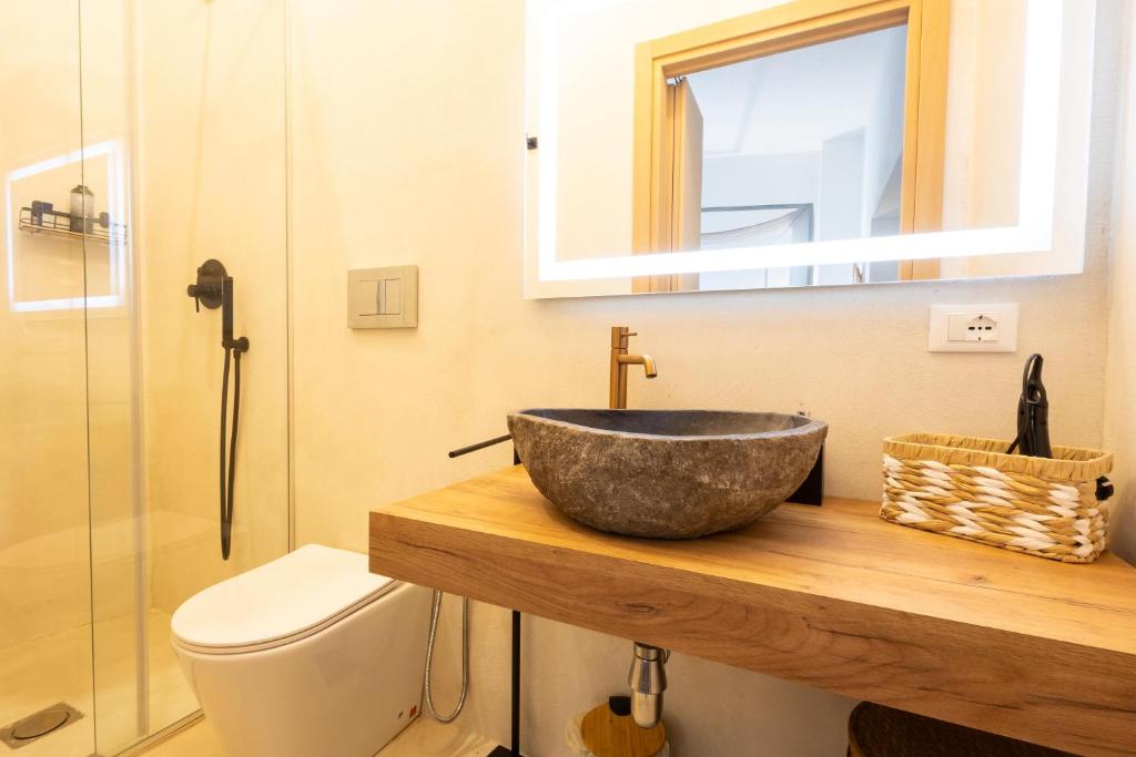 Koupelna v ubytování Rada room&suite