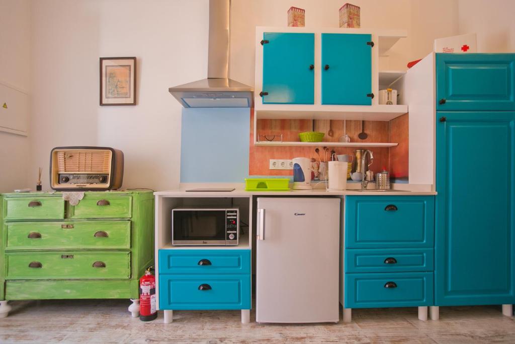 Kuchyň nebo kuchyňský kout v ubytování Casas da villa - Apartments