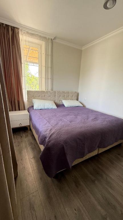 Postel nebo postele na pokoji v ubytování Tazia Appartments