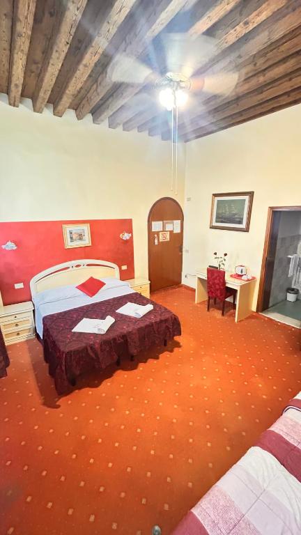 Uma cama ou camas num quarto em Casa Lin Venice Zimmer