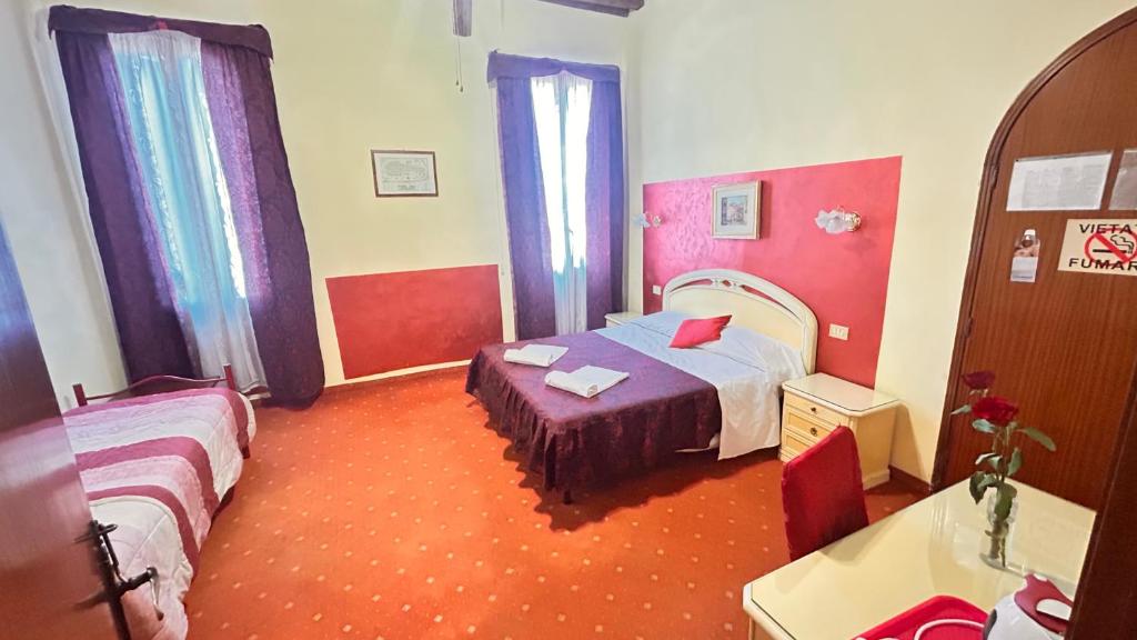 Uma cama ou camas num quarto em Casa Lin Venice Zimmer