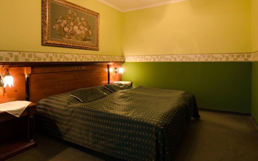 Postel nebo postele na pokoji v ubytování Grand Hotel Residence - Boutique Hotel