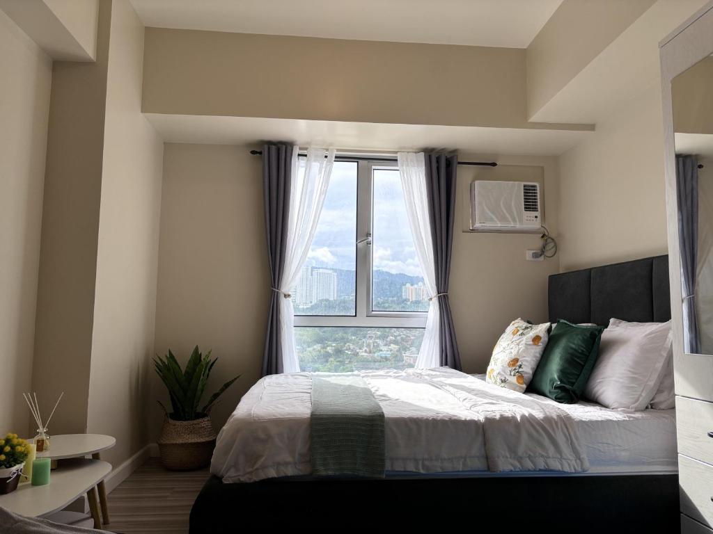 Postel nebo postele na pokoji v ubytování Virgo Nest Rentals