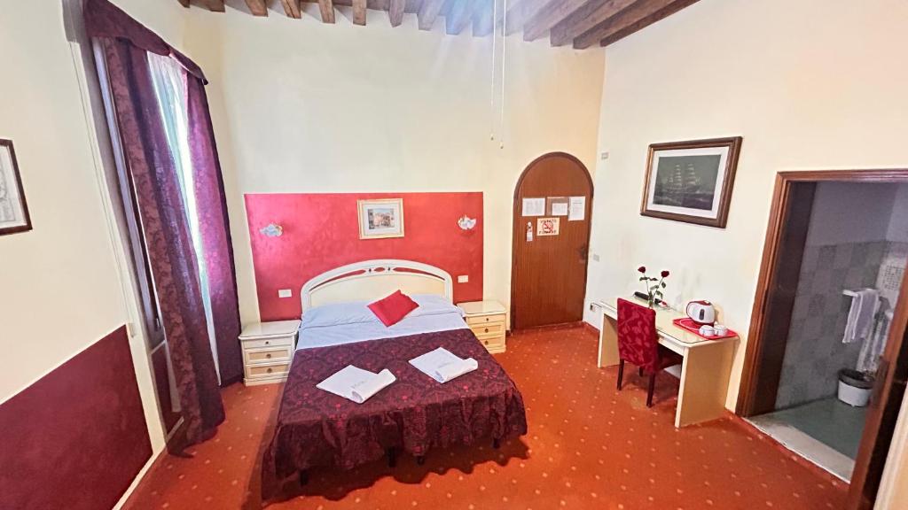 Uma cama ou camas num quarto em Casa Lin Venice Zimmer