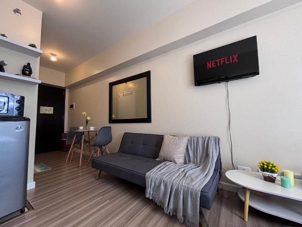 TV a/nebo společenská místnost v ubytování Virgo Nest Rentals