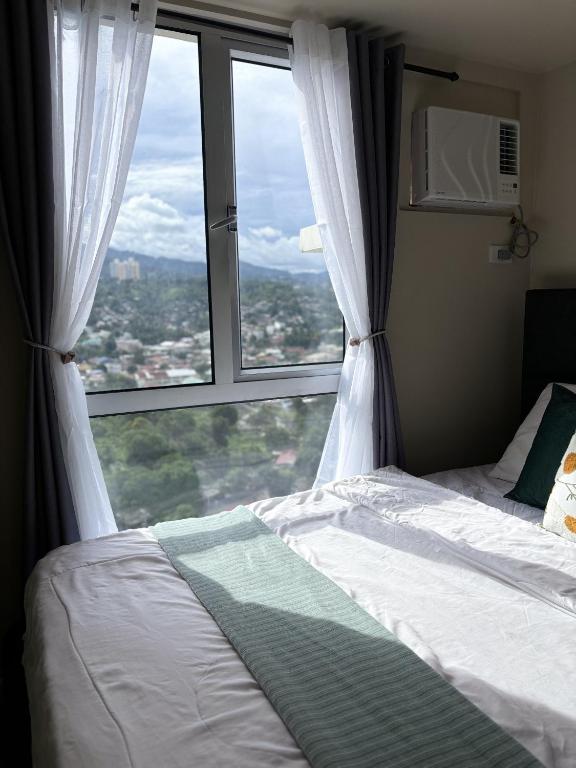 Postel nebo postele na pokoji v ubytování Virgo Nest Rentals
