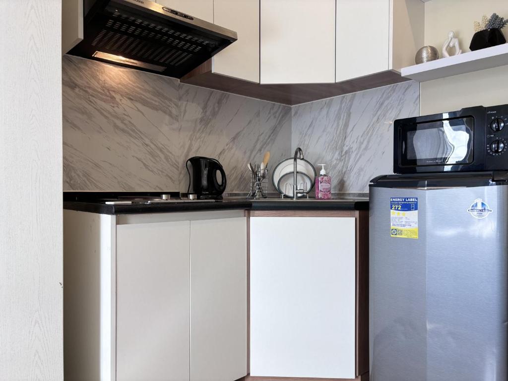 Kuchyň nebo kuchyňský kout v ubytování Virgo Nest Rentals
