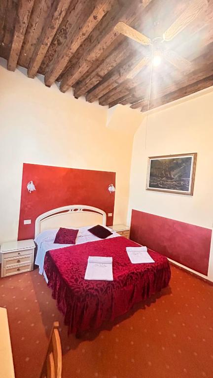 Uma cama ou camas num quarto em Casa Lin Venice Zimmer