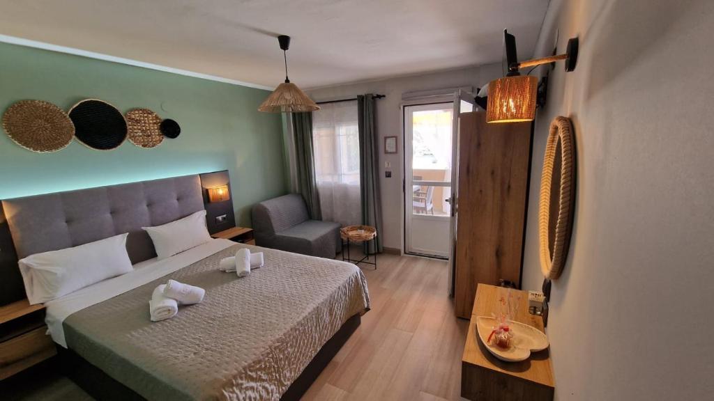 Postel nebo postele na pokoji v ubytování Ladario Studios