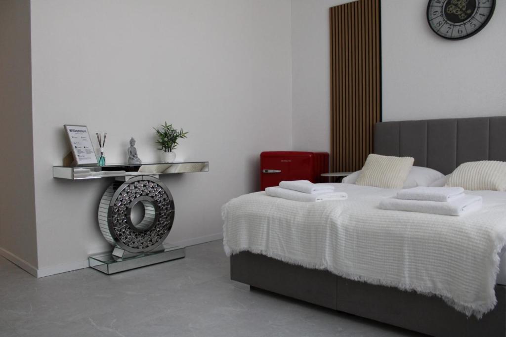 Postel nebo postele na pokoji v ubytování Résidence Appartment Gebenstorf