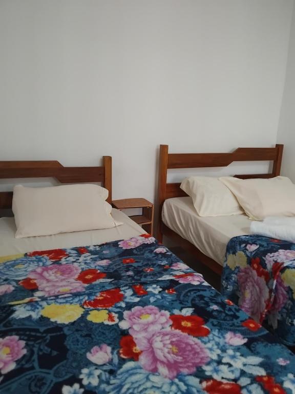 Postel nebo postele na pokoji v ubytování Casa Aconchego em Lençóis