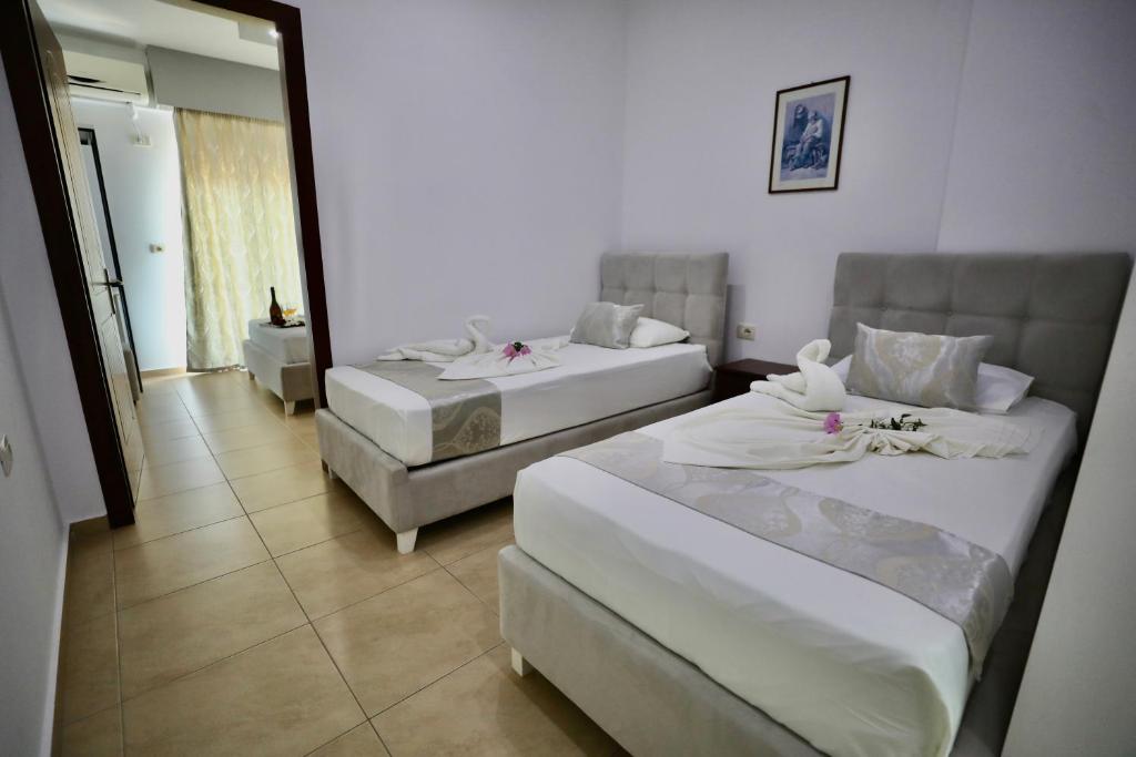Postel nebo postele na pokoji v ubytování Hotel Soan