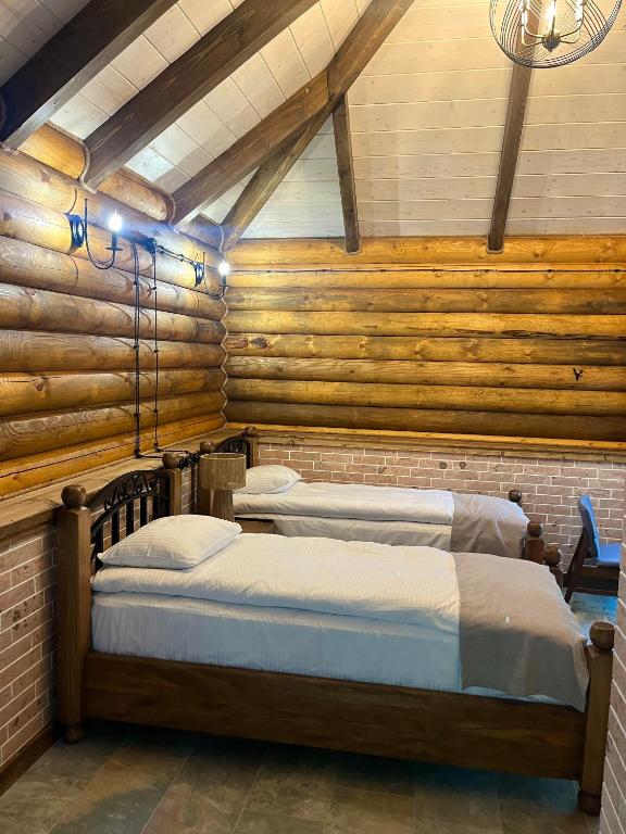 Postel nebo postele na pokoji v ubytování Getahovit Resort