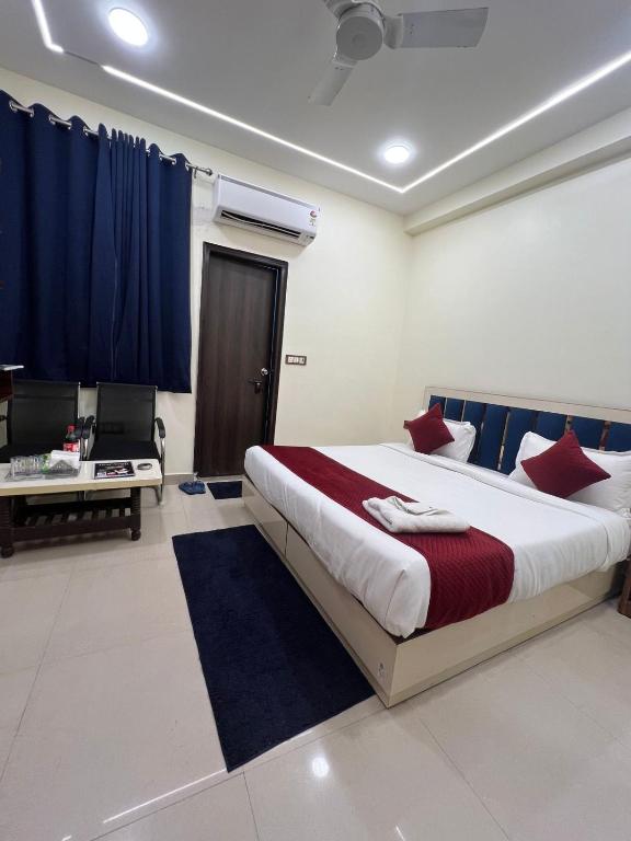 Ένα ή περισσότερα κρεβάτια σε δωμάτιο στο Hotel Hayat Inn