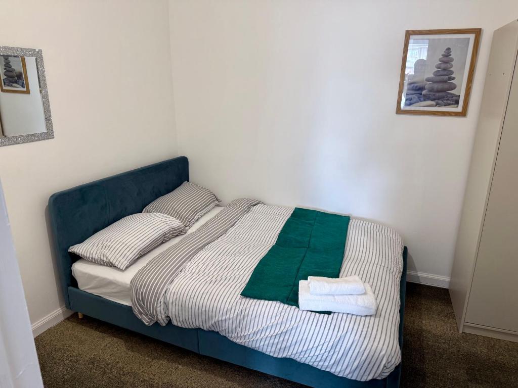Postel nebo postele na pokoji v ubytování O5 Property
