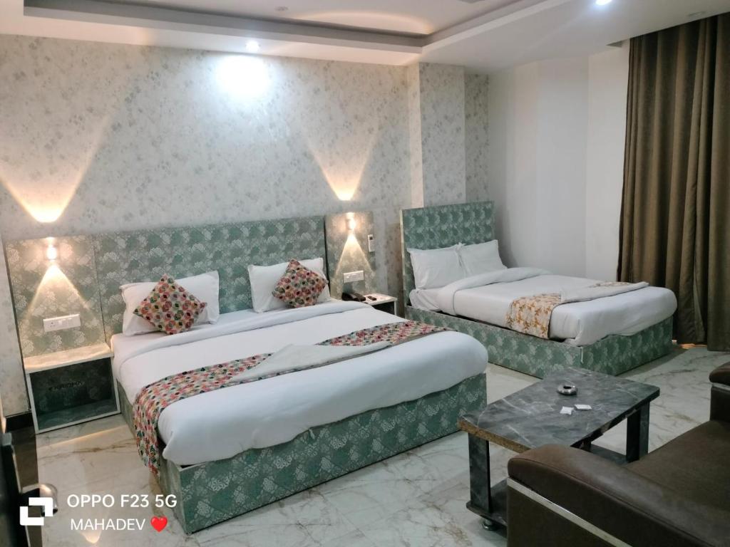 Ένα ή περισσότερα κρεβάτια σε δωμάτιο στο Hotel Hayat Inn