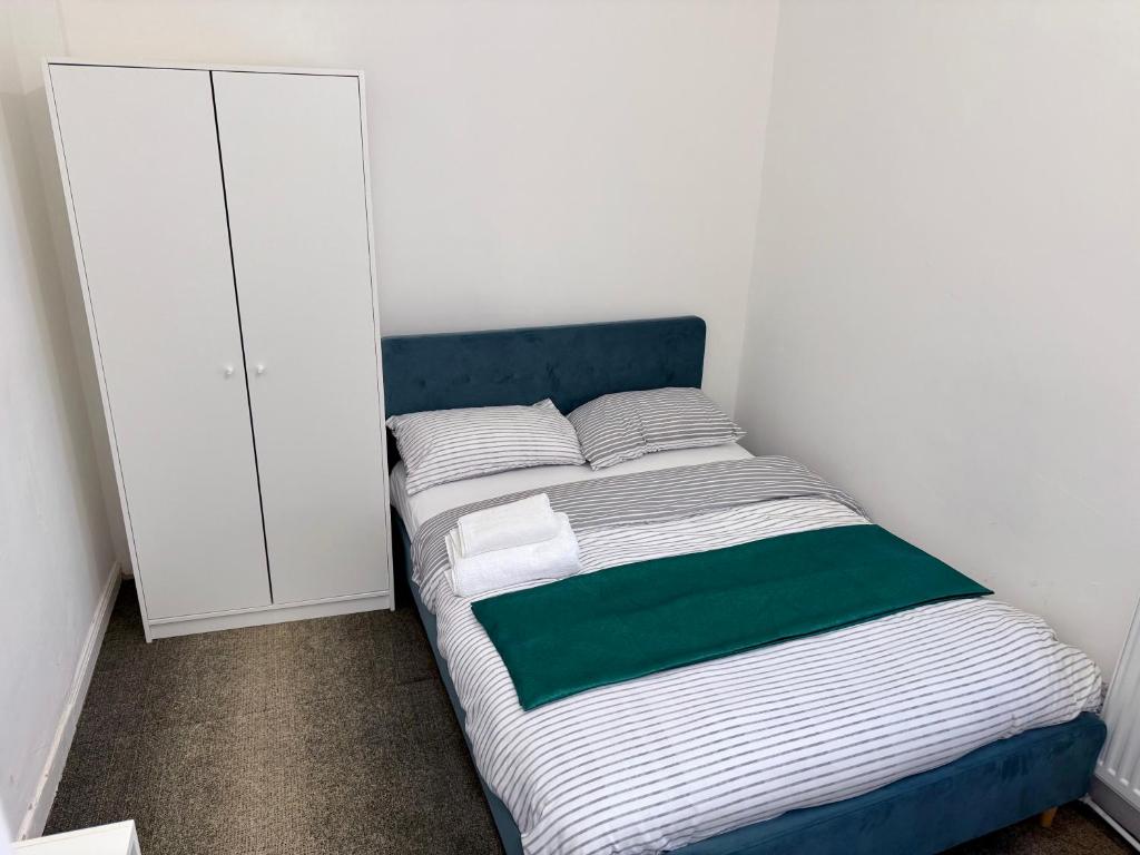 Postel nebo postele na pokoji v ubytování O5 Property