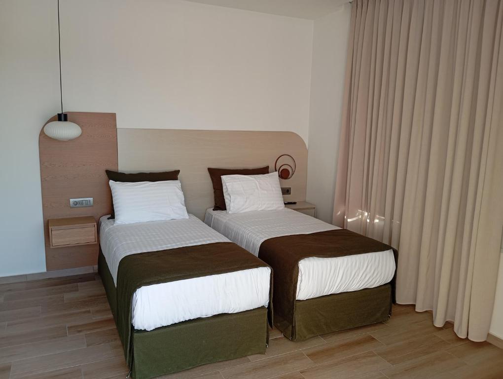 Postel nebo postele na pokoji v ubytování Afea Villas