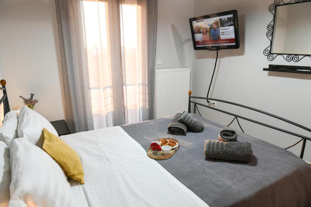 Postel nebo postele na pokoji v ubytování Corinthian Green Villa