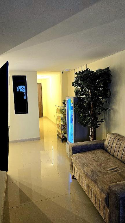 TV a/nebo společenská místnost v ubytování Hotel Jelt Aeropuerto