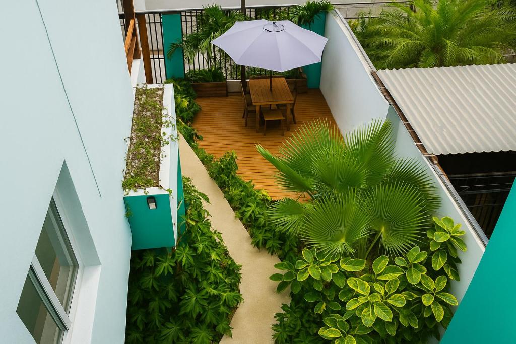 Um jardim em Villa Sofia Hotel Boutique Cancun