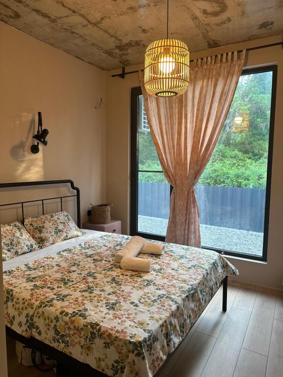 Giường trong phòng chung tại The Best House