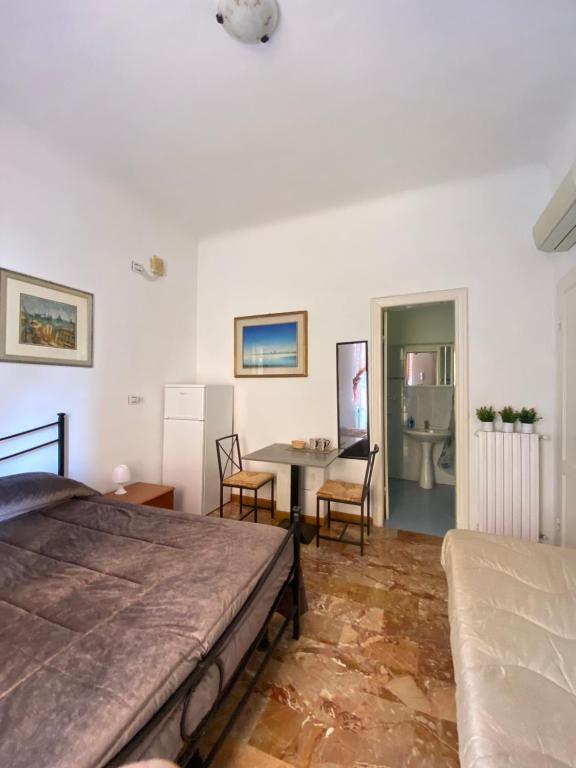 Postel nebo postele na pokoji v ubytování Il Nido Al Mare ROOM