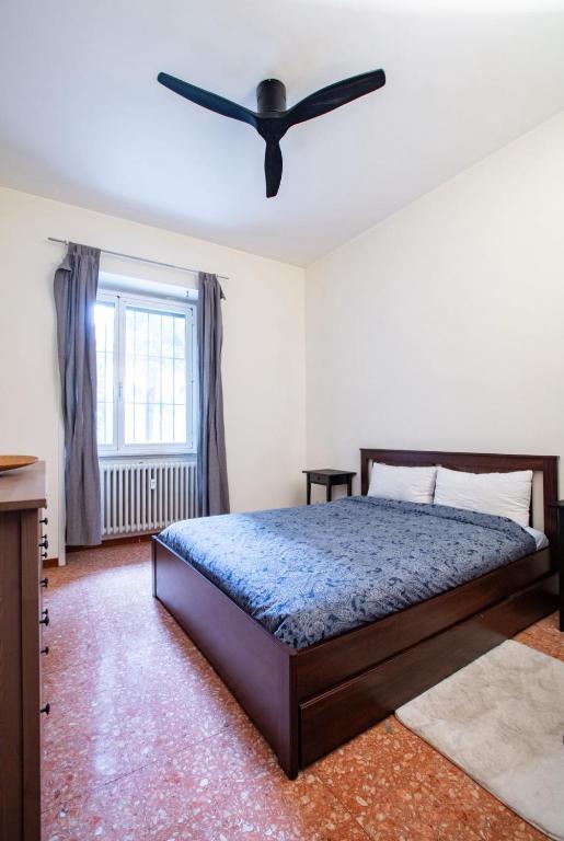A bed or beds in a room at Entire home/apt in Milan near Fairs and Navigli