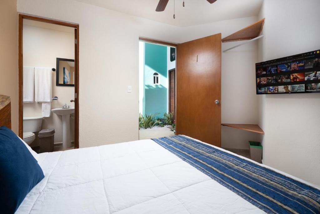 Cama ou camas em um quarto em Villa Sofia Hotel Boutique Cancun