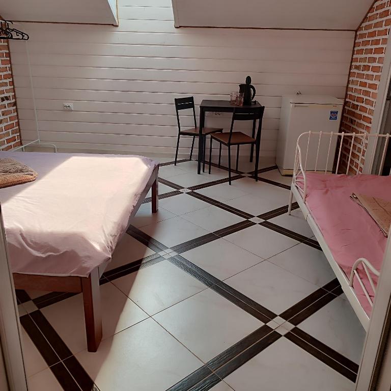 Postel nebo postele na pokoji v ubytování Svitiaz Griada