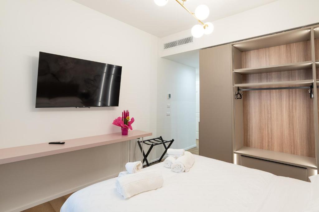 Postel nebo postele na pokoji v ubytování Maison Rasella Palace Suites