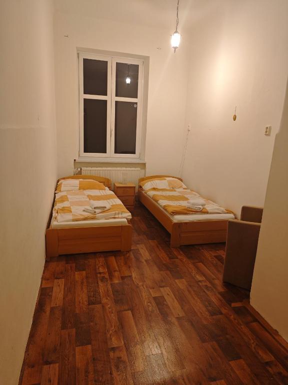 Postel nebo postele na pokoji v ubytování APARTAMENT CIESZYN
