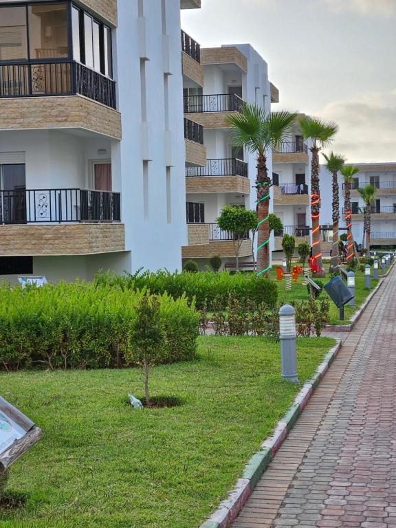 En have udenfor Résidence Al Yakout - Grand Appartement Avec Piscine