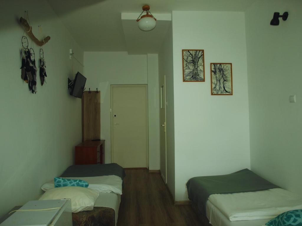 Postel nebo postele na pokoji v ubytování Zibi i Pod Topolami
