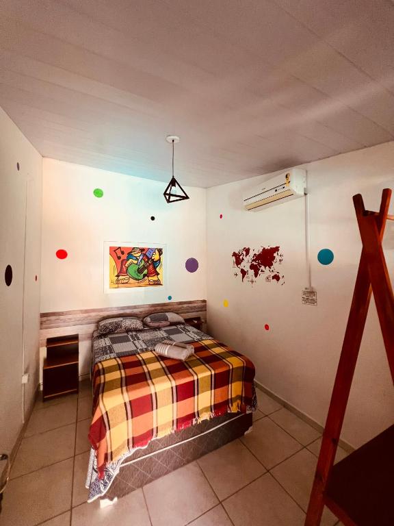 Postel nebo postele na pokoji v ubytování Casa Kuki's