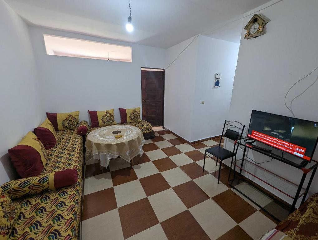 TV a/nebo společenská místnost v ubytování Appartement d'été
