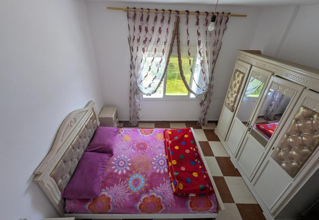 Postel nebo postele na pokoji v ubytování Appartement d'été